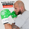 man in safe green boxing gloves