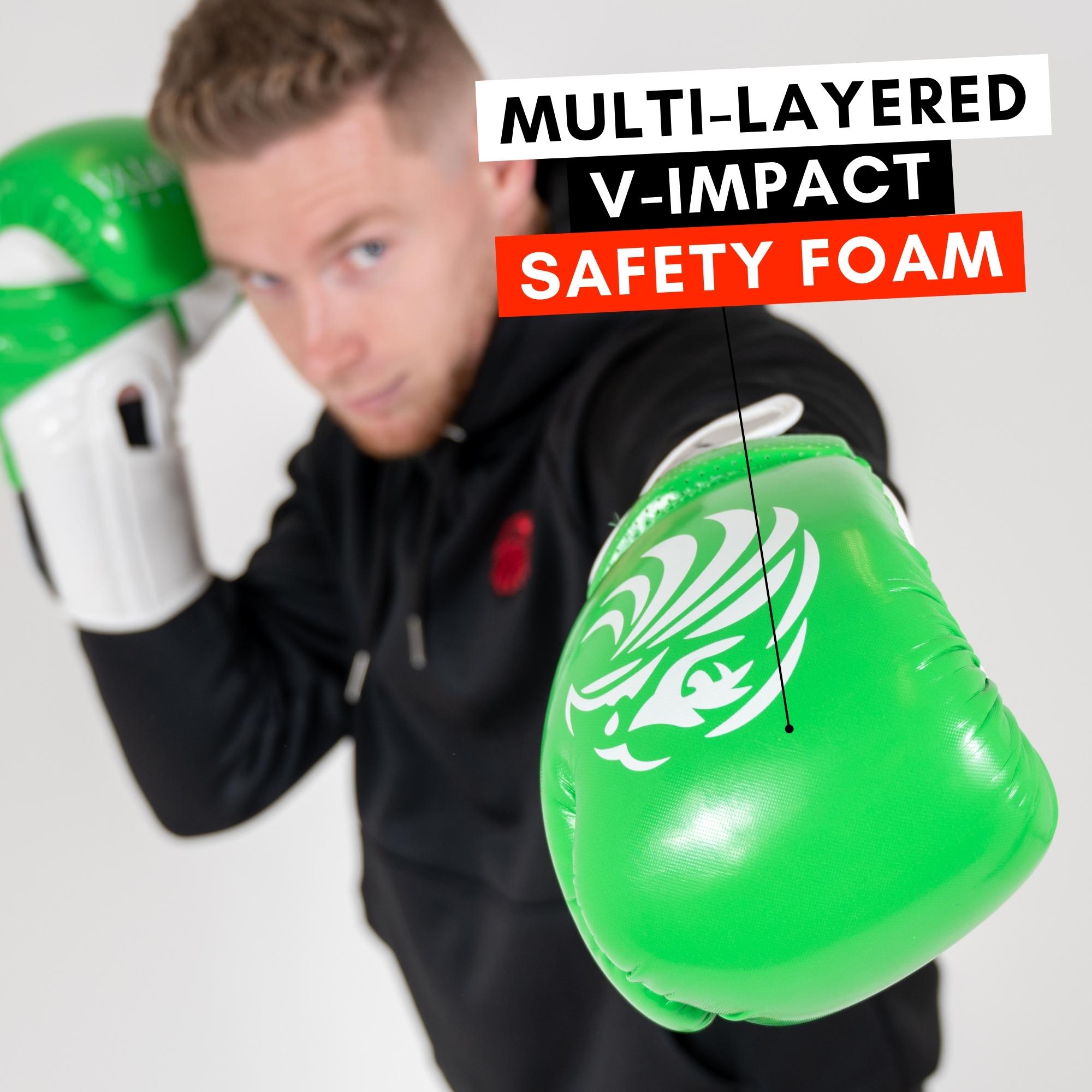 man punching in green boxing gloves UK