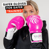 Fitness woman in pink boxing gloves for women