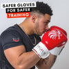 man punching in red valour strike boxing gloves